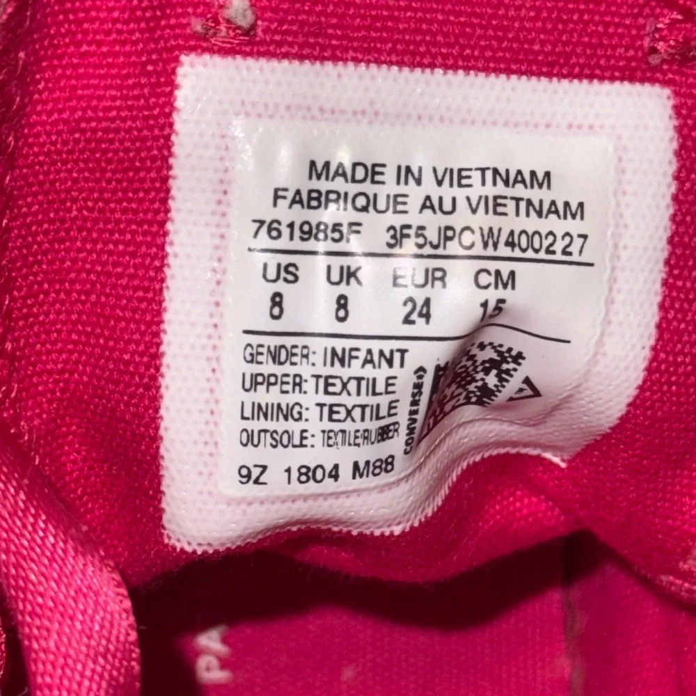 Bold Pink Low-Top Sneakers with Lace-Up Design